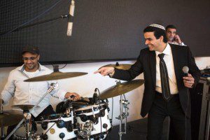 Israeli singer Zion Golan performs at a wedding celebration in Netivot