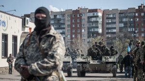 Man stands near tank in Slavyansk, Ukraine