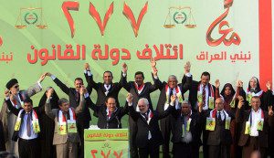 Maliki takes part in a ceremony in Kerbala