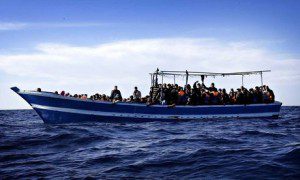 Boat carrying migrants off coast of Libya