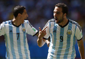 Argentina's Higuain celebrates next to Di Maria after scoring a goal against Belgium during their 2014 World Cup quarter-finals in Brasilia