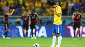 Striker Brasil Fred tertunduk lesu usai timnya ditekuk 1-7 oleh Jerman
